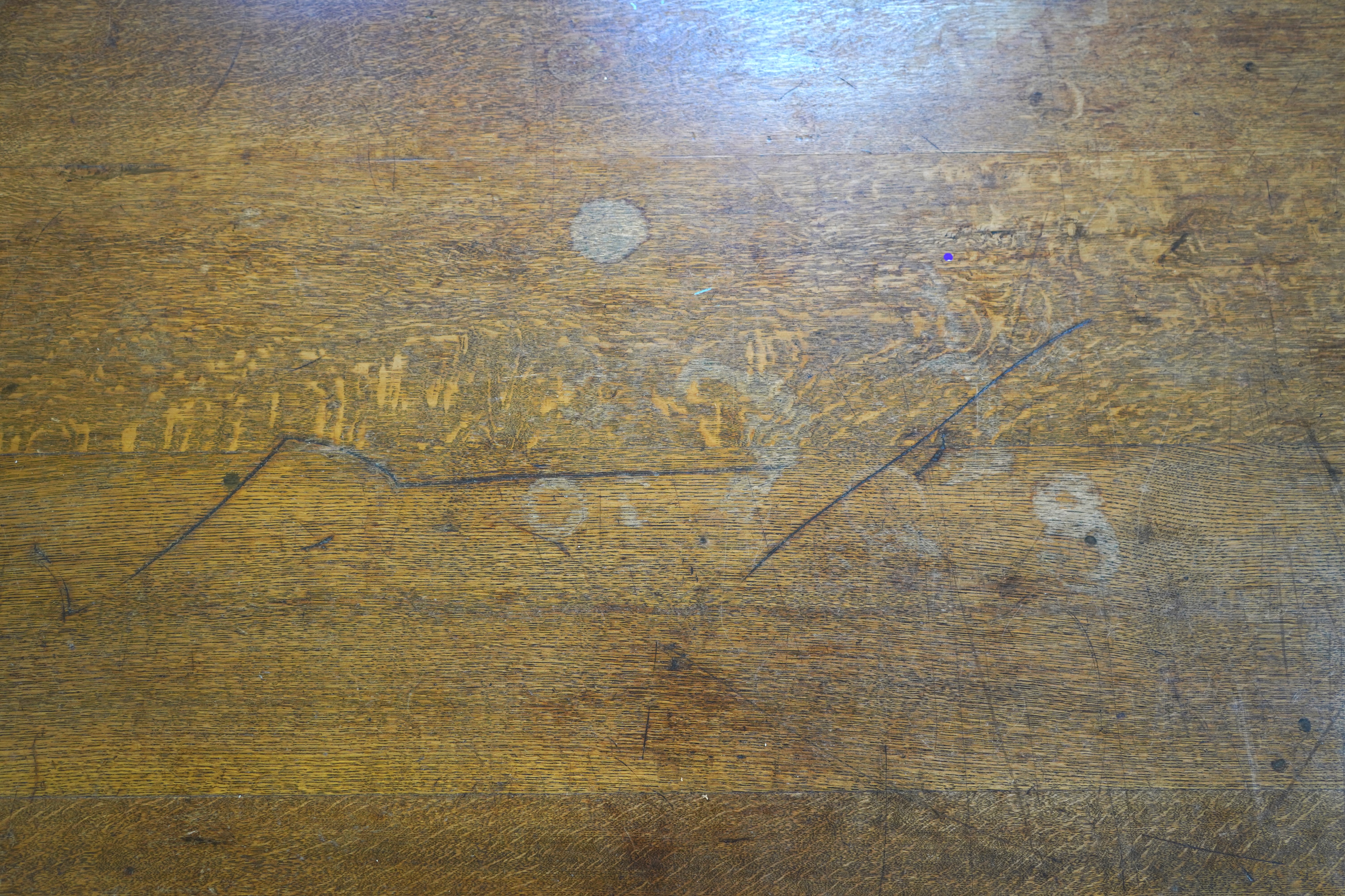 An Arts and Crafts oak refectory dining table